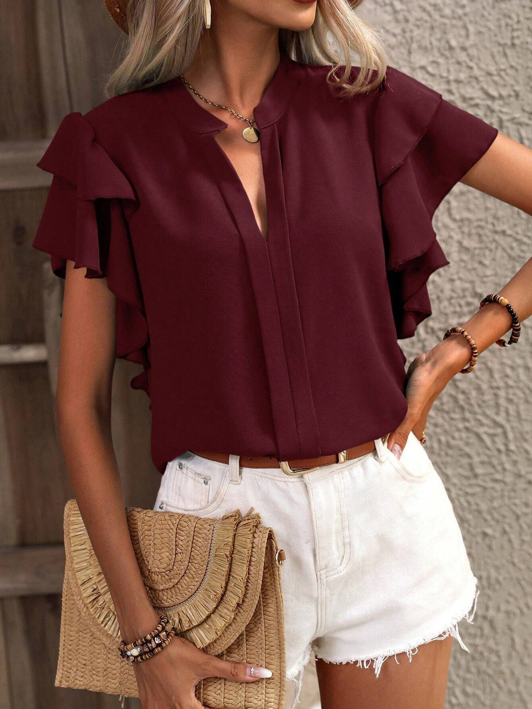 Women Elegant top with voluminous ruffled sleeves and V-neck Lune London
