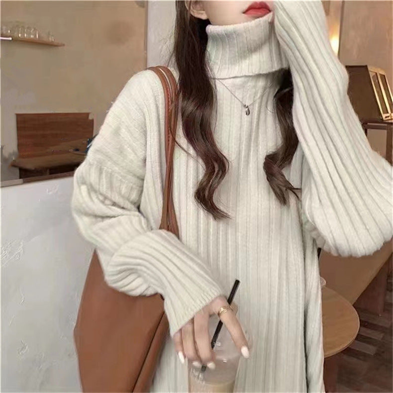 Woman Knit top with turtleneck and asymmetrical cut and fine ribbed structure Lune London