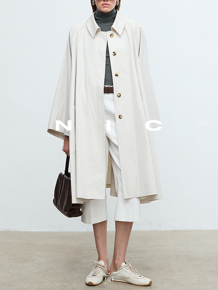 Manteau de trench décontracté pour femmes avec des manches surdimensionnées et des détails de boutons Chic & Stil