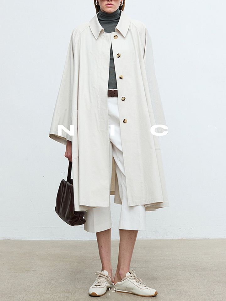 Manteau de trench décontracté pour femmes avec des manches surdimensionnées et des détails de boutons Chic & Stil