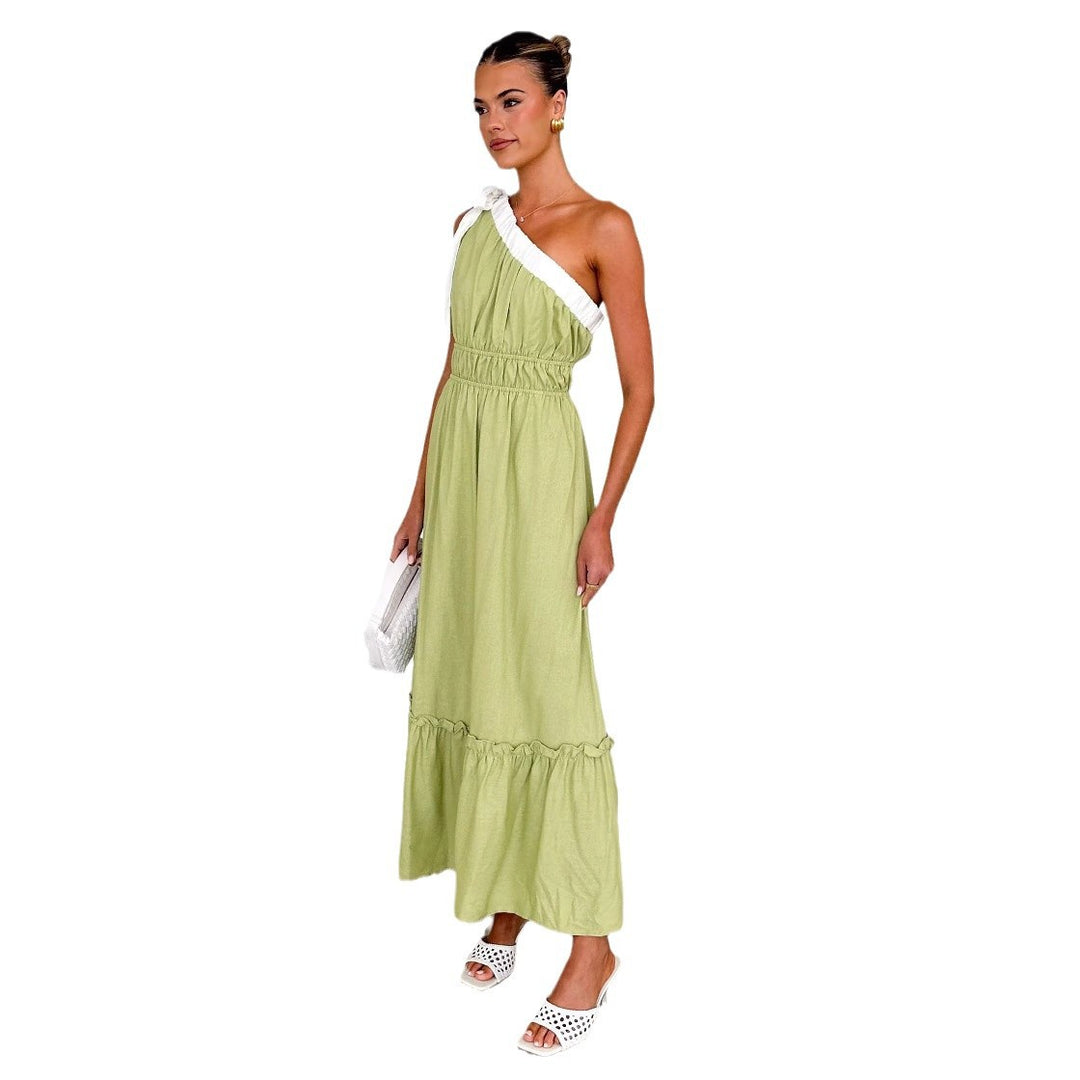Women's maxi dress with asymmetrical shoulder design and flowing pleated skirt