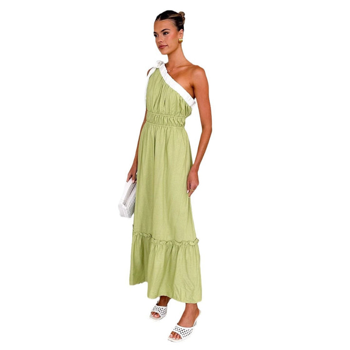Women's maxi dress with asymmetrical shoulder design and flowing pleated skirt