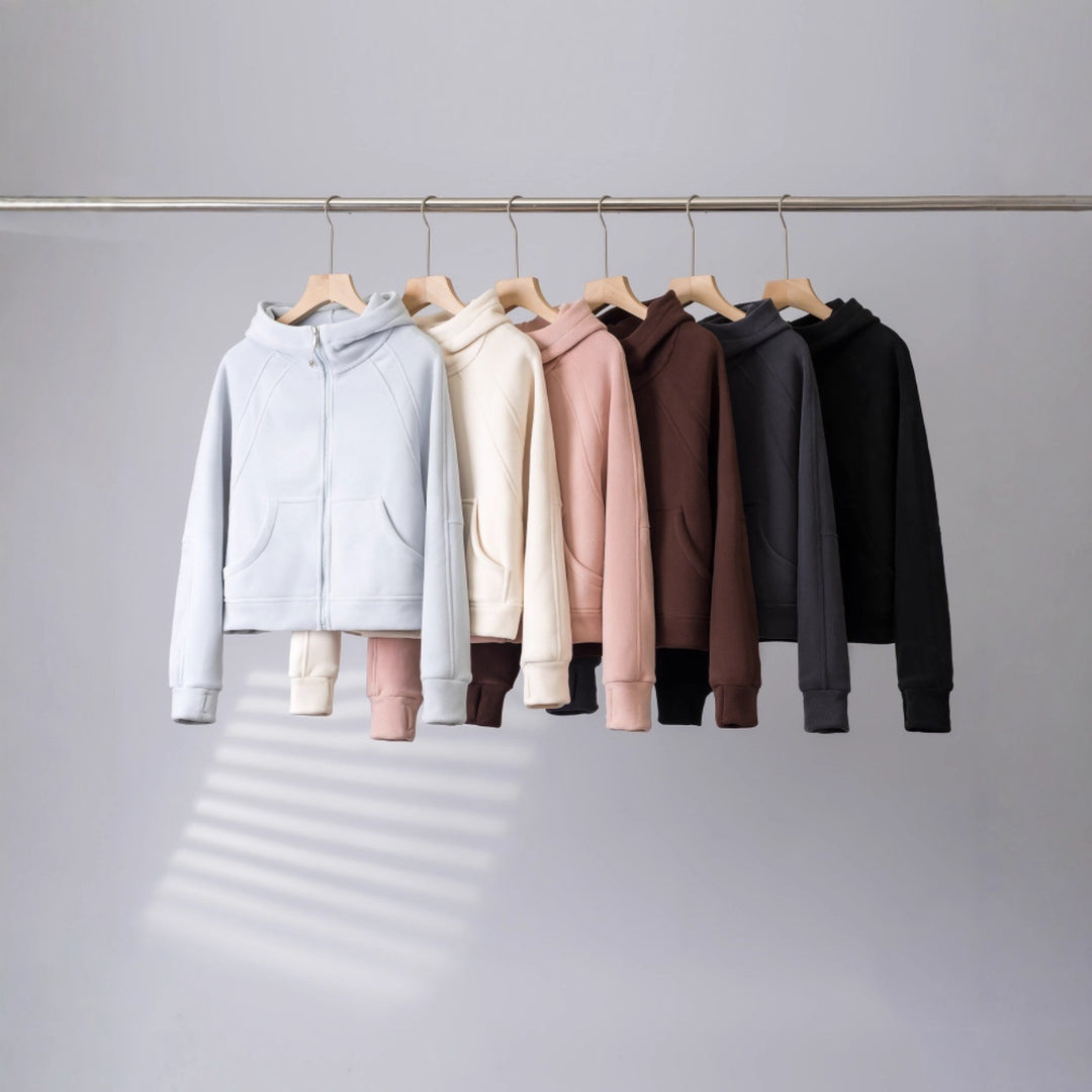 Veste à capuche confortable pour femme avec col montant et poches pratiques Chic & Stil