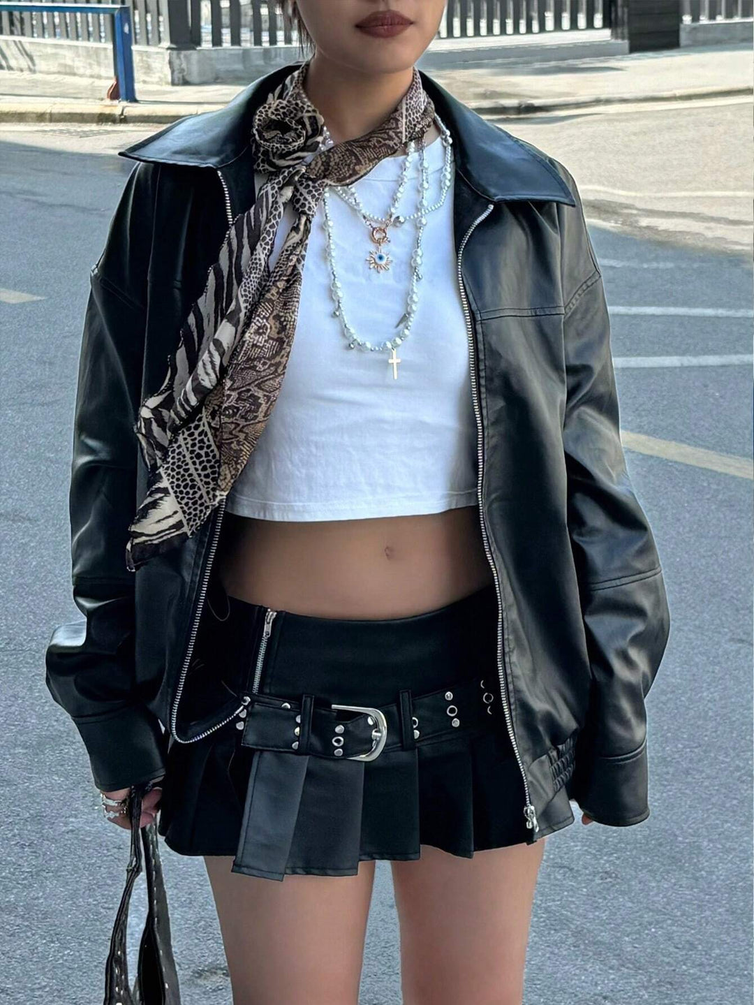 Short leather jacket for women with a stylish cut and practical details Lune London