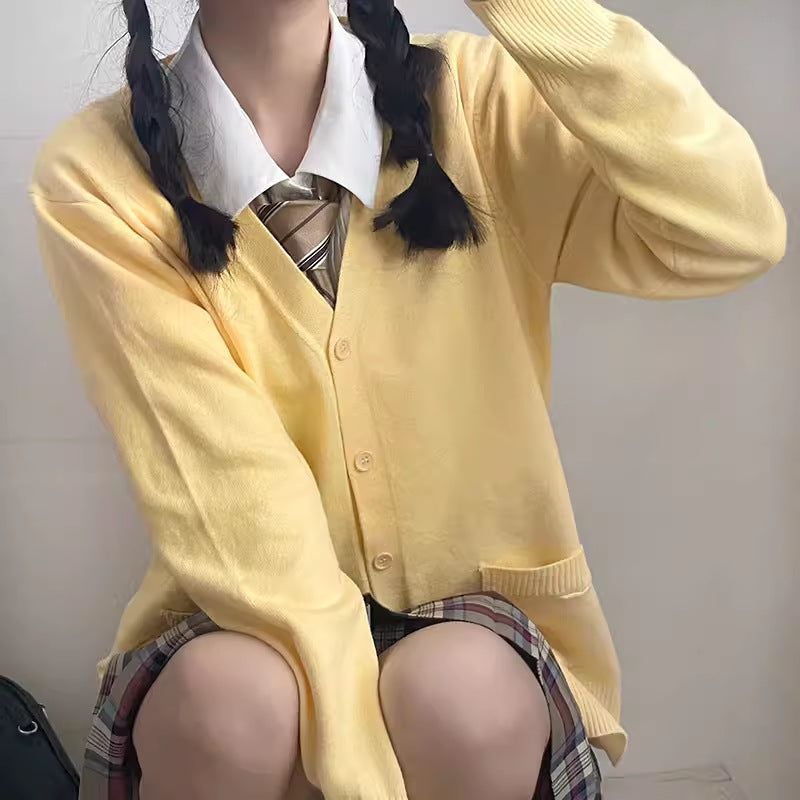 Cardigan féminin ludique avec grand col et détail de nœud Chic & Stil