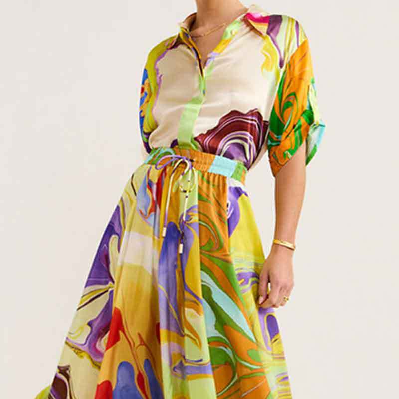 Robe maxi femme avec design coloré artistique et ceinture élastique Chic & Stil