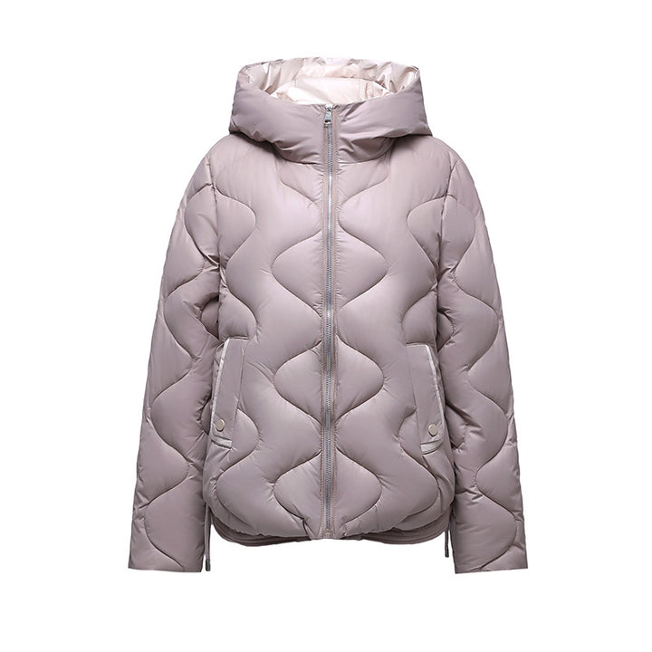 Insulated quilted jacket for women with high collar and practical zip pockets Lune London
