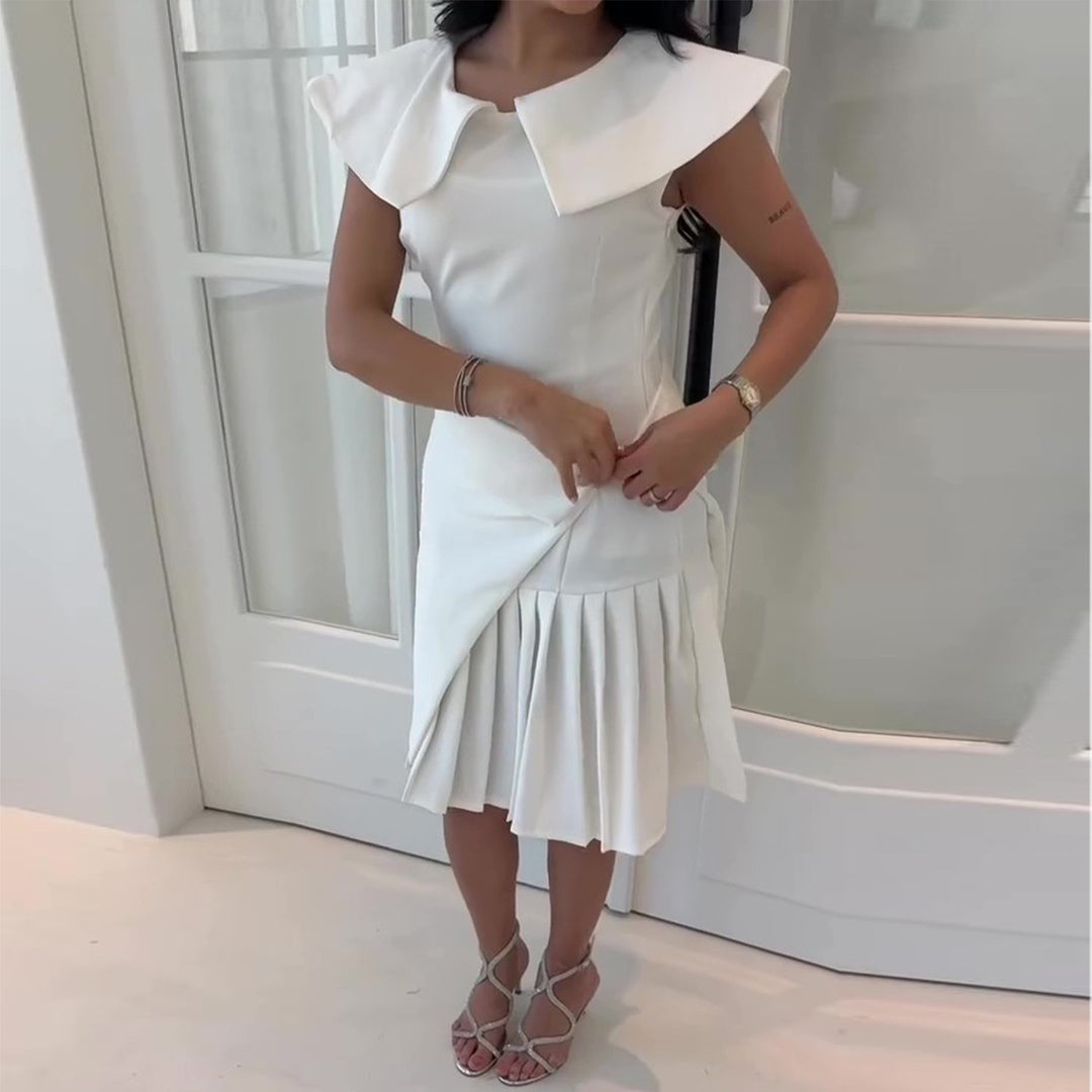 Women's wrap dress with pleated hem and elegant collar details Lune London