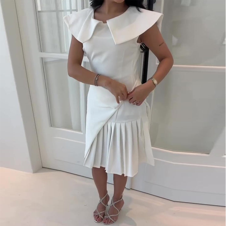 Women's wrap dress with pleated hem and elegant collar details Lune London