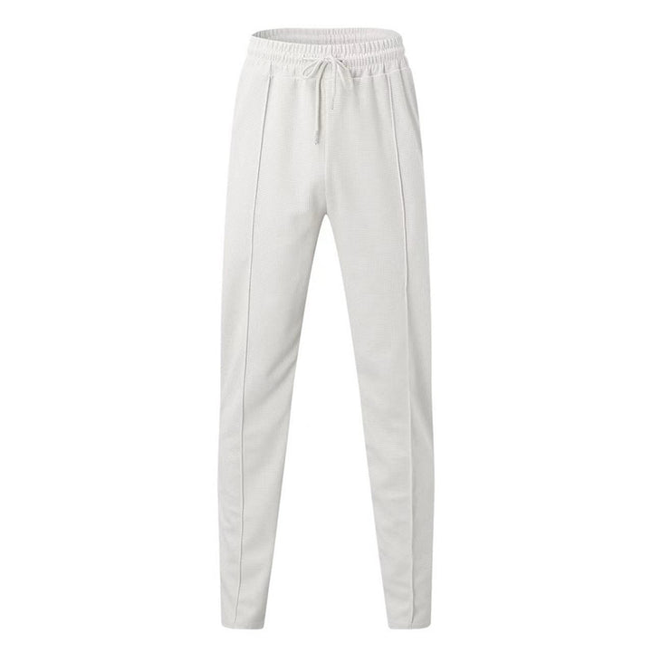 Sports jogger pants for men with elastic waistband and zip pockets Lune London