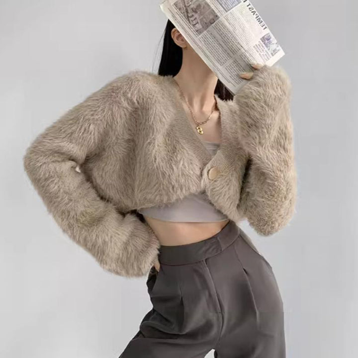 Cropped knitted jacket for women with voluminous sleeves and button detail Lune London