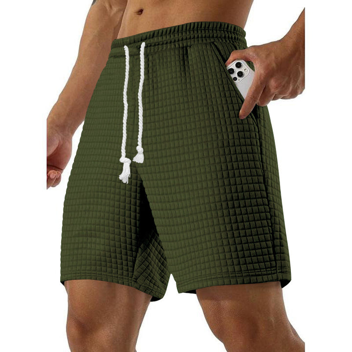 Men's sports shorts in breathable material with practical side pockets Lune London