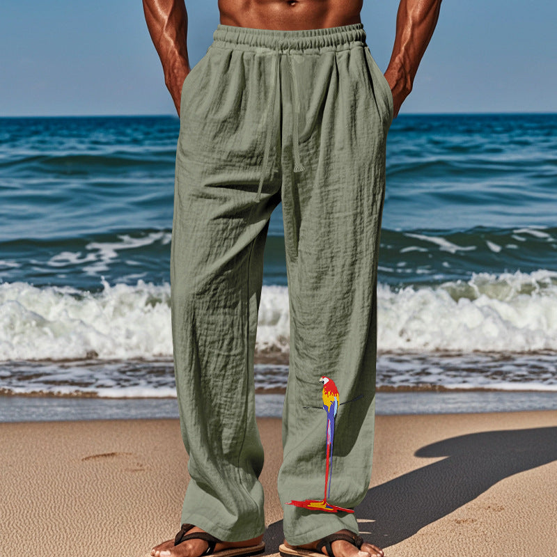 Casual beach pants for men with elastic waistband and colorful bird pattern Lune London