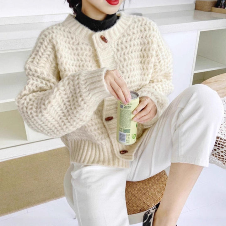 Chunky knit sweater for women with decorative button placket and honeycomb pattern Lune London