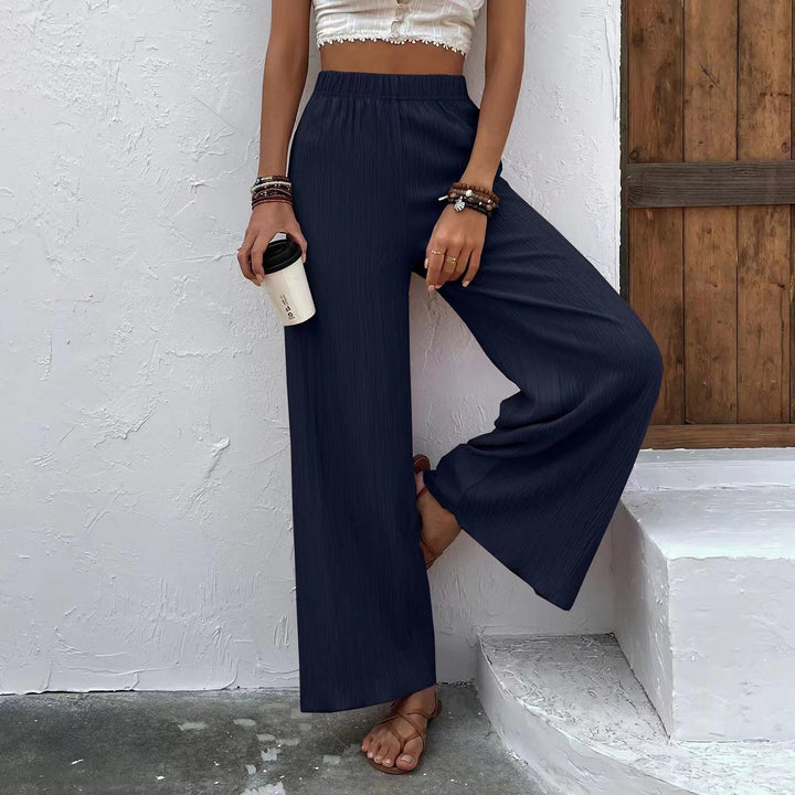 Wide pleated pants for women with elastic waist and elegant drape Lune London