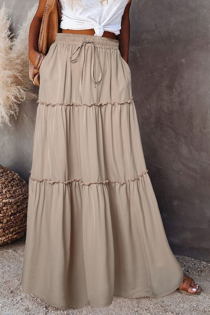 Long and flowing skirt for women with an elastic waistband and practical pockets Lune London