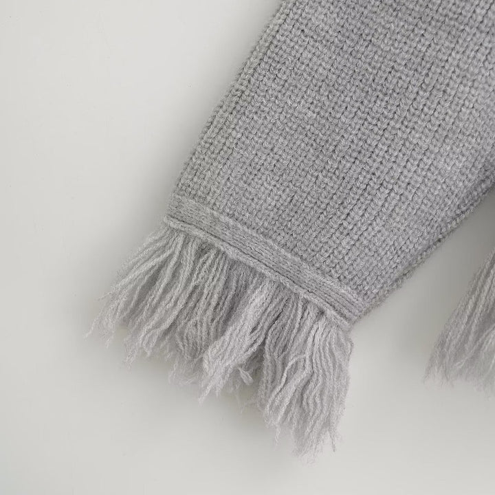 Ladies cardigan with fringed edges and button details Lune London
