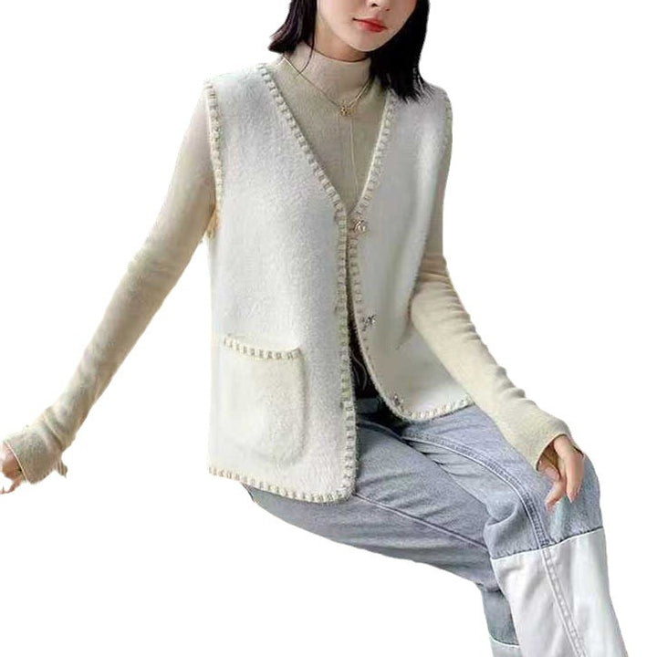 Ladies knitted vest with decorative button details Lune London