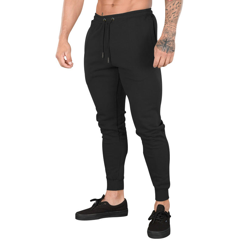 Men's sporty jogger pants with elastic waistband and practical zip pockets Lune London