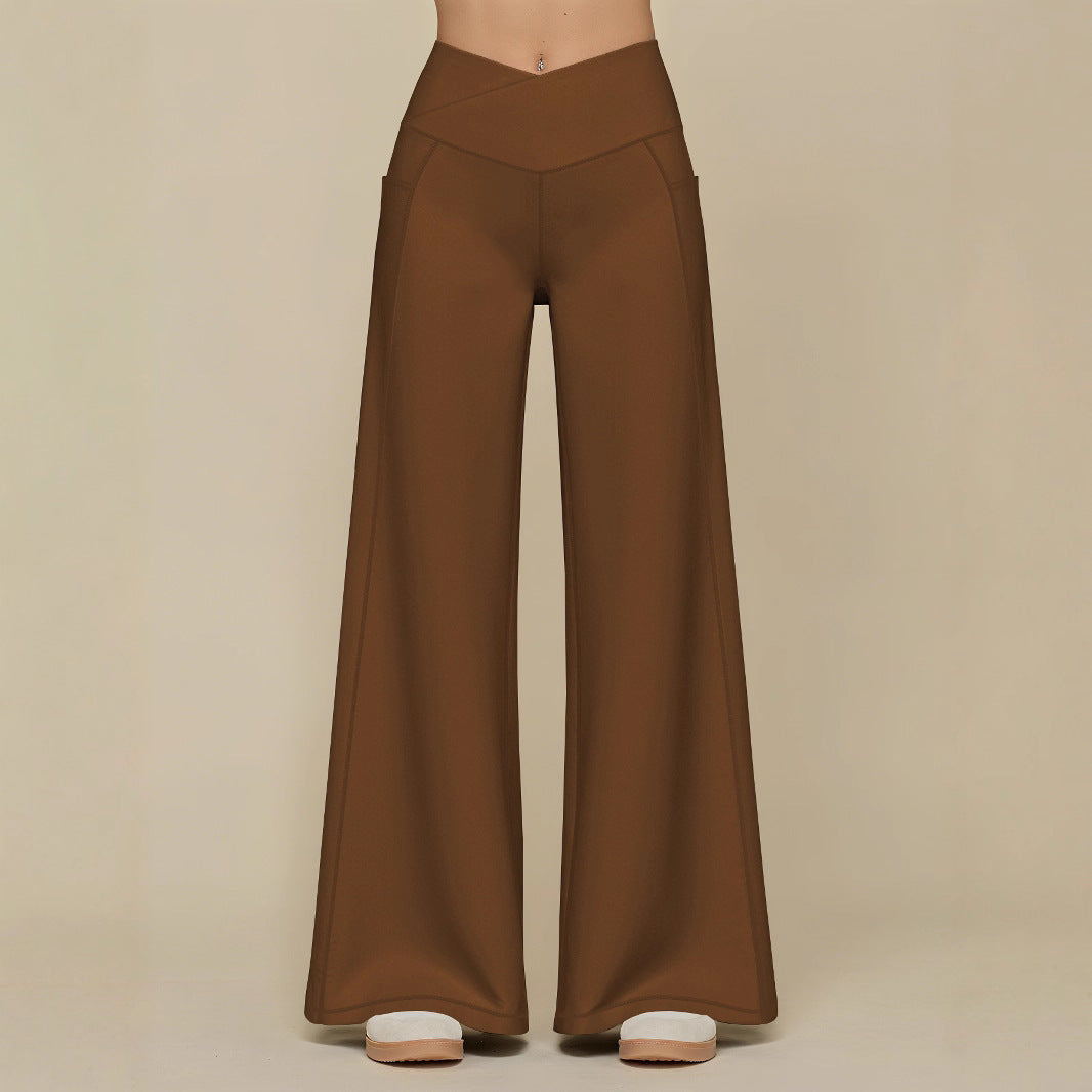 Elegant high-waisted casual trousers for women, with wide legs and practical pockets Lune London