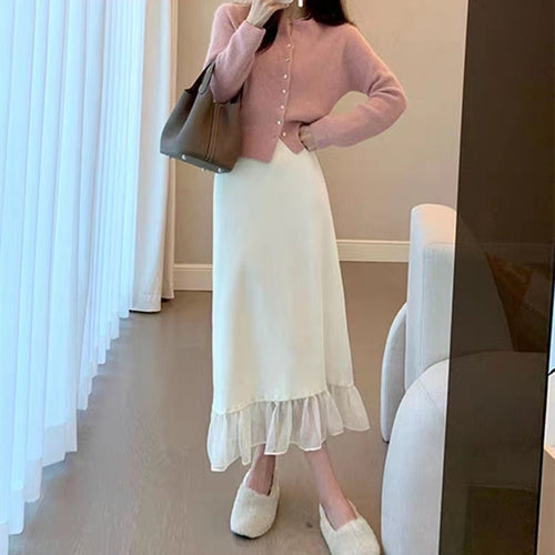 Cardigan féminin à la mode avec boutons et ourlet à volants Chic & Stil
