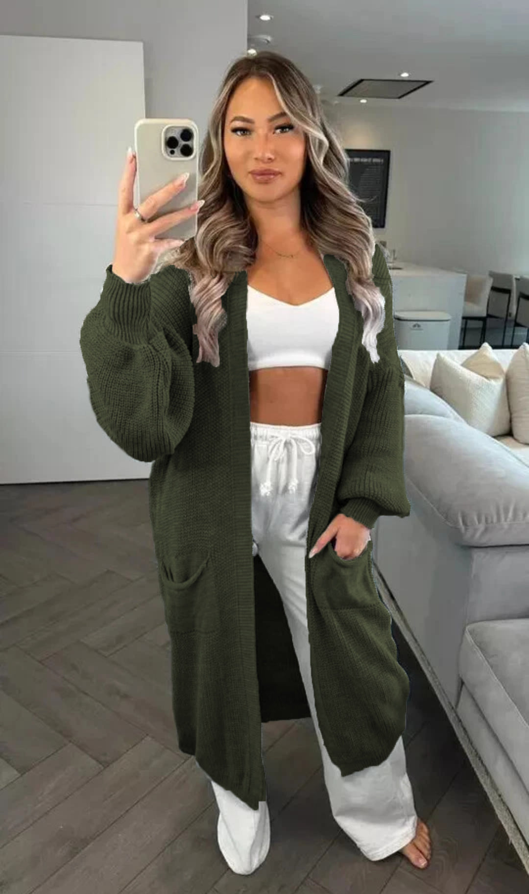 Chunky knit cardigan for women with a relaxed oversized style with practical pockets Lune Londonl
