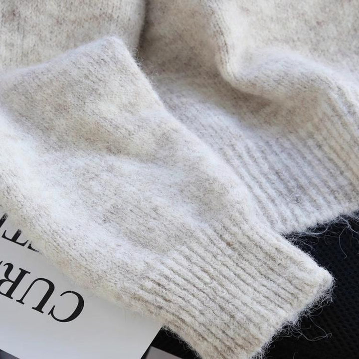 Cardigan femme cozy avec détails de boutons en forme de cœur et accent de nœud Chic & Stil