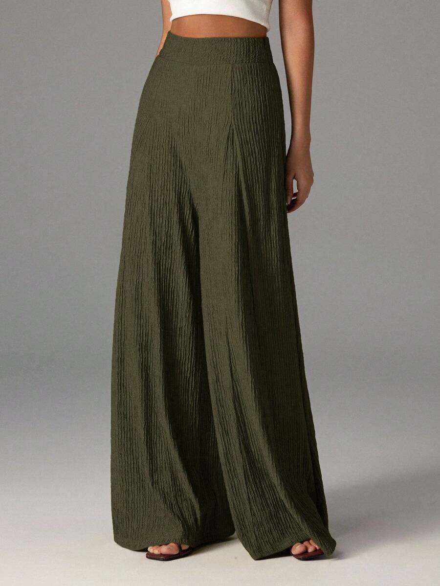 Wide pleated pants for women with high waist and elastic waistband Lune London