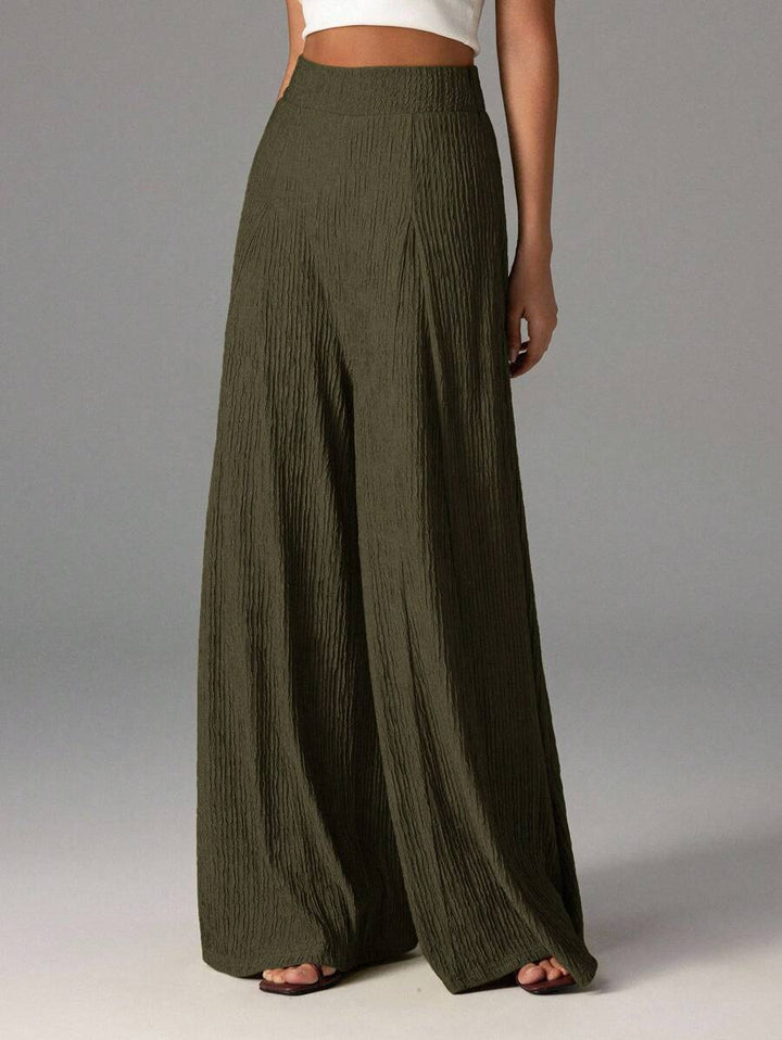 Wide pleated pants for women with high waist and elastic waistband Lune London