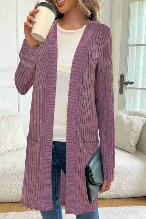 Long knitted jacket for women with side pockets and textured design Lune London