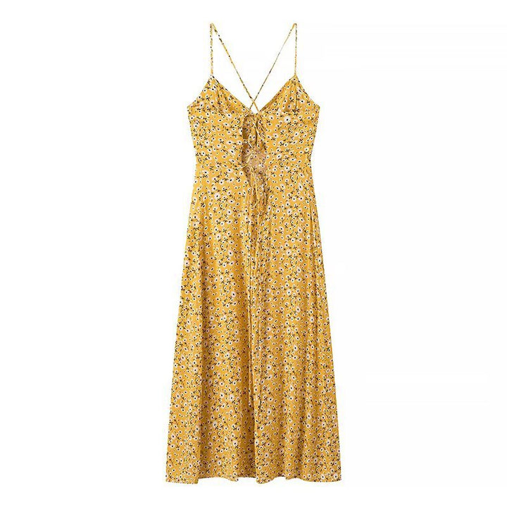Summer dress for women with a lovely floral print and playful straps Lune London