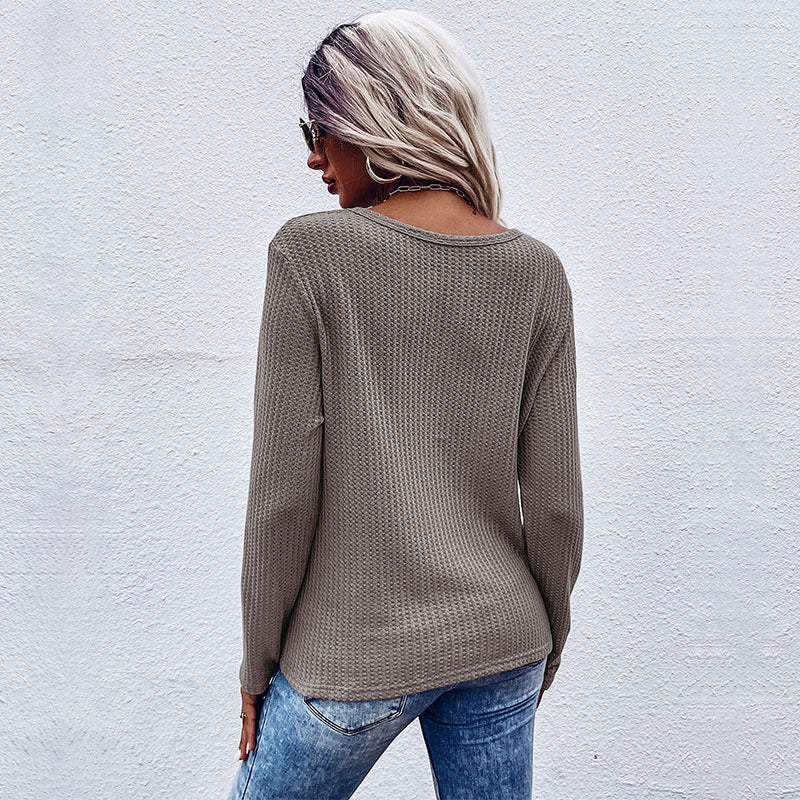 Women's casual long sleeve t-shirt with button details and textured design Lune London