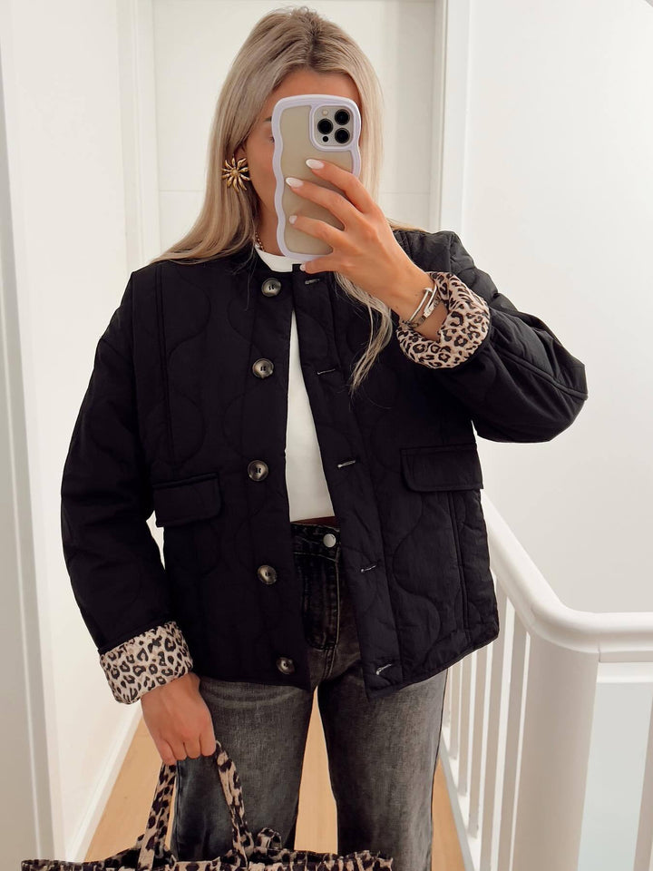Ladies quilted transition jacket with practical pockets Lune London