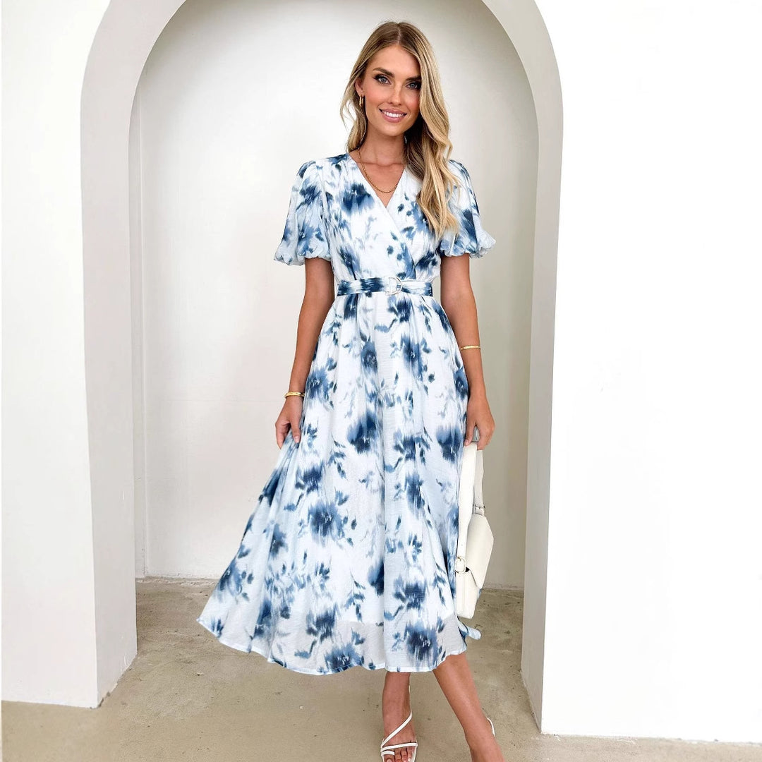 Midi dress for women with a playful wrap design and floral accents Chic & Stil