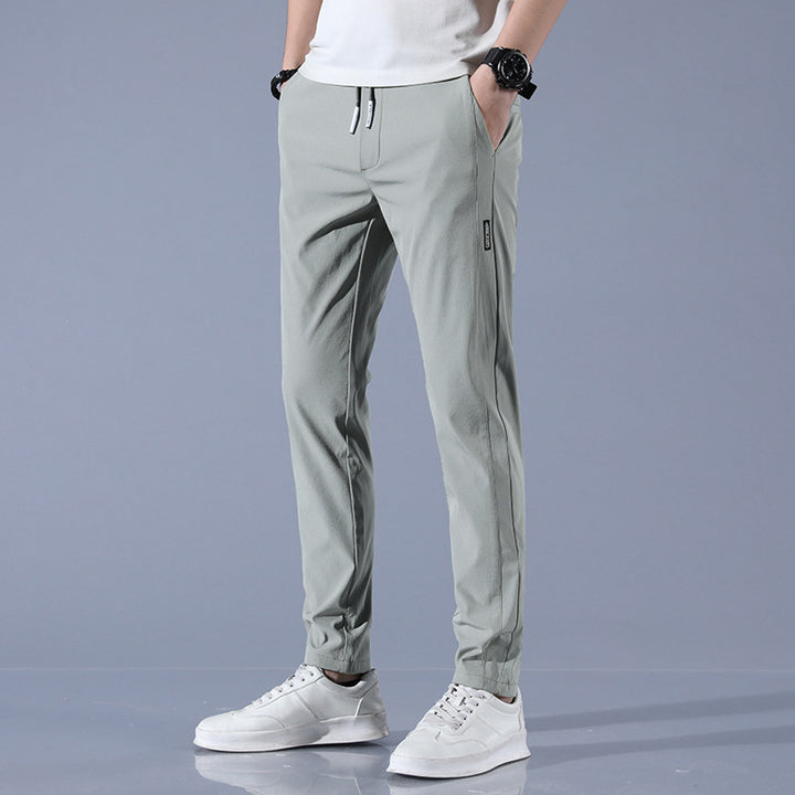Men's sports pants with adjustable drawstring and zippered pockets on the sides Lune London