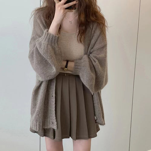 Elegant knit jacket with wide sleeves and refined details Lune London