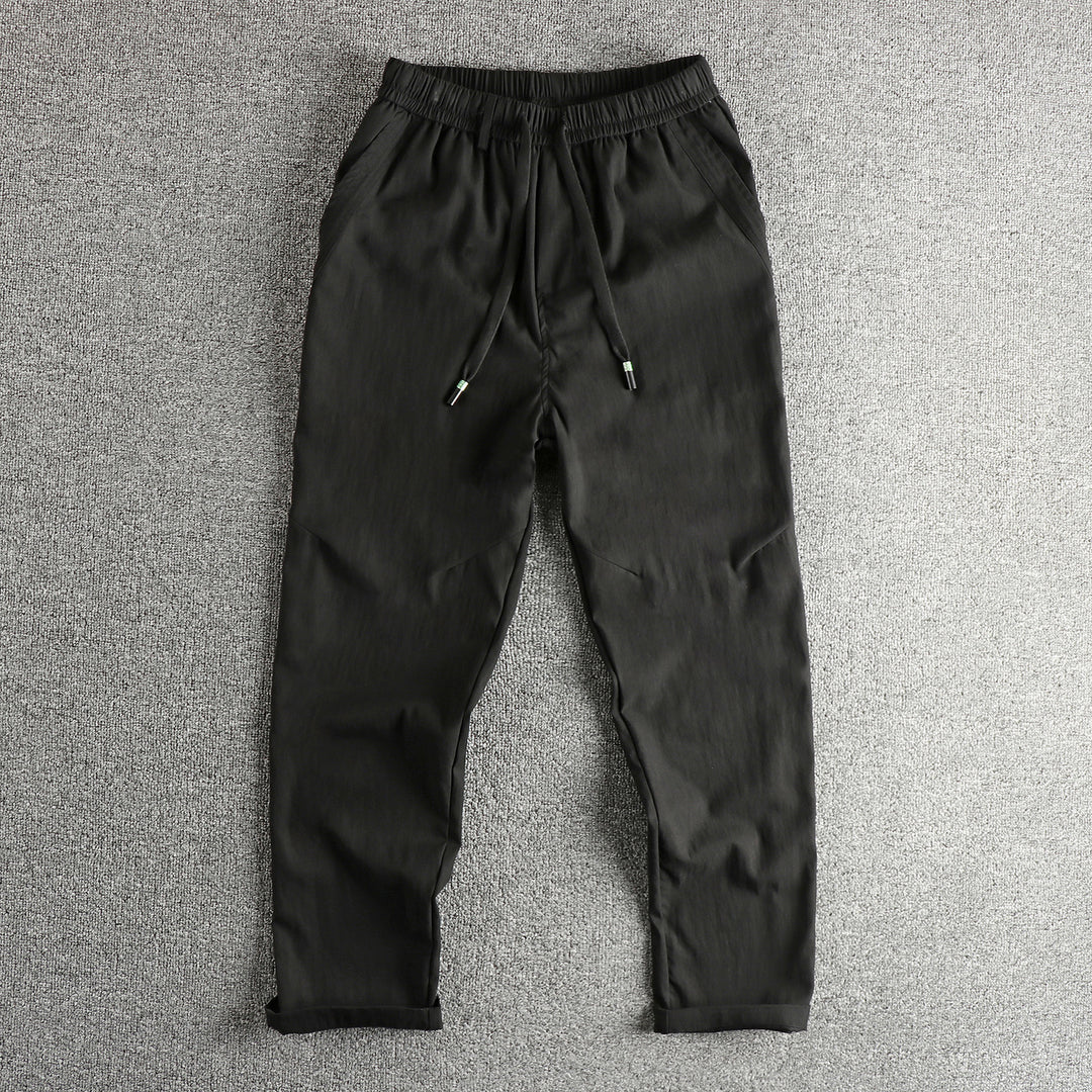 Men's athletic leisure pants with elastic waistband and practical drawstring Lune London