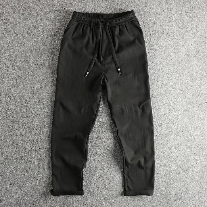 Men's athletic leisure pants with elastic waistband and practical drawstring Lune London