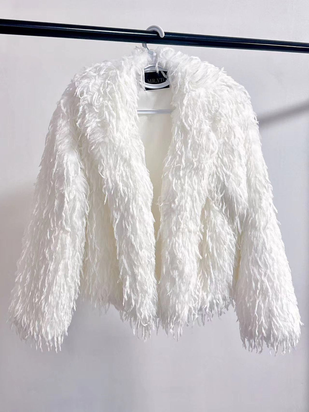 Ladies Short Cozy Jacket in Synthetic Fur with Chic and Stylish V-Neck