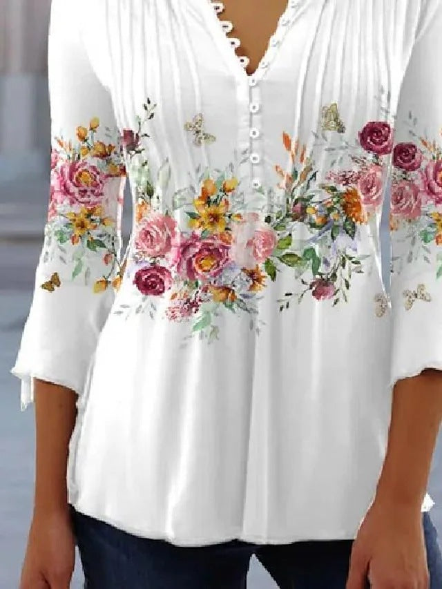 Blouse pour femmes avec imprimé floral et détails de boutons Chic & Stil