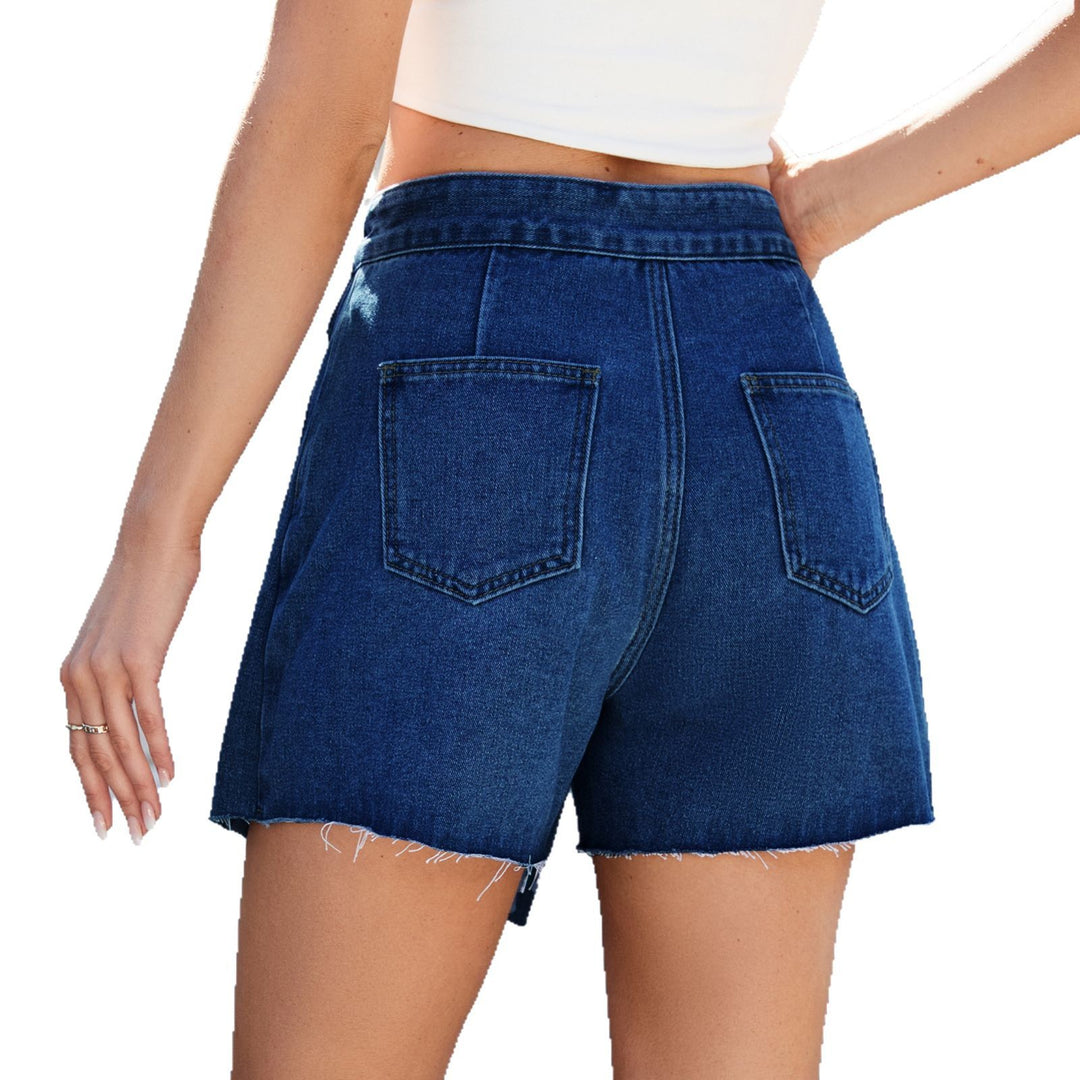Denim dress for women with asymmetrical hem and practical pockets Lune London