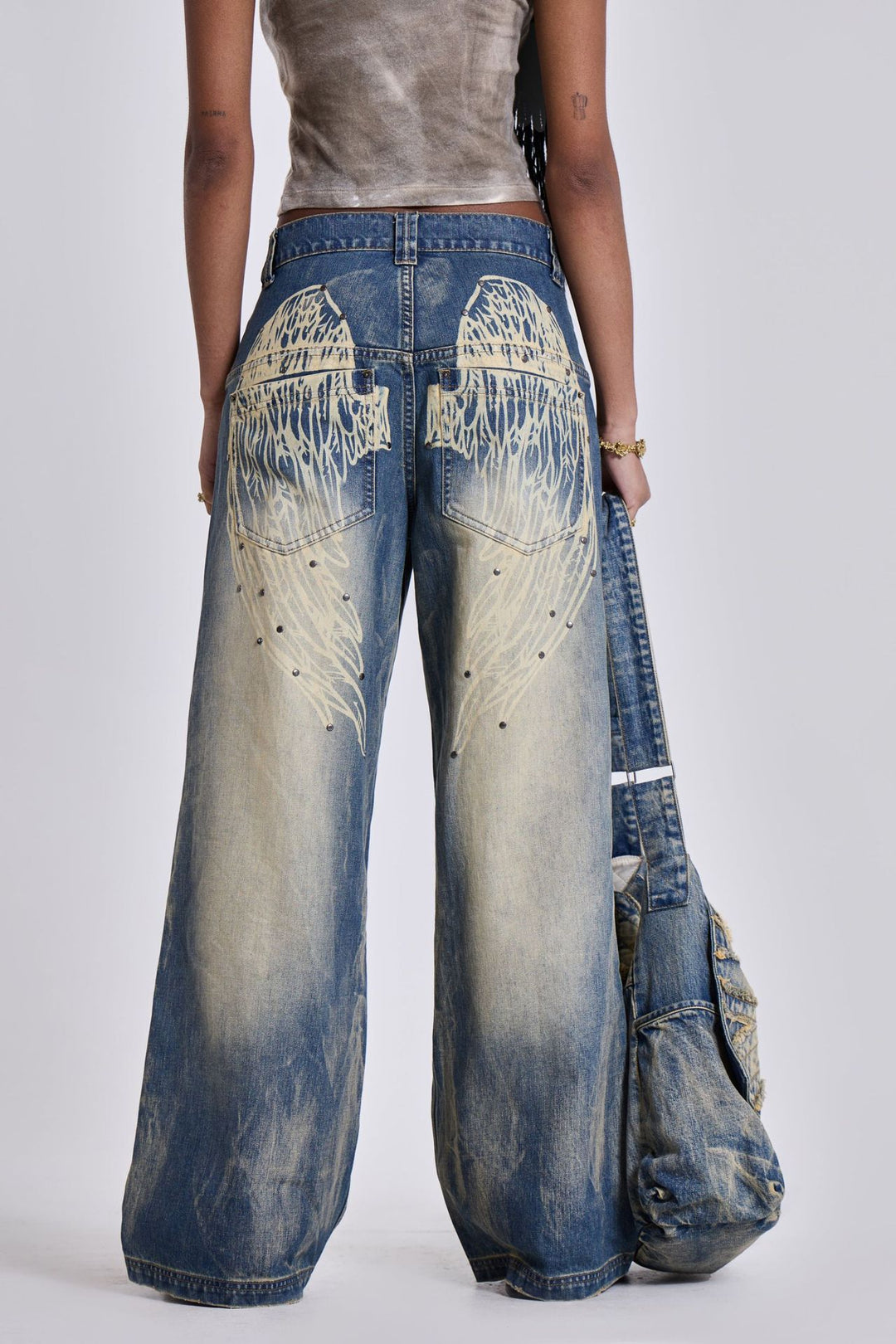 Women's wide jeans with artistic wing design and unique details Lune London