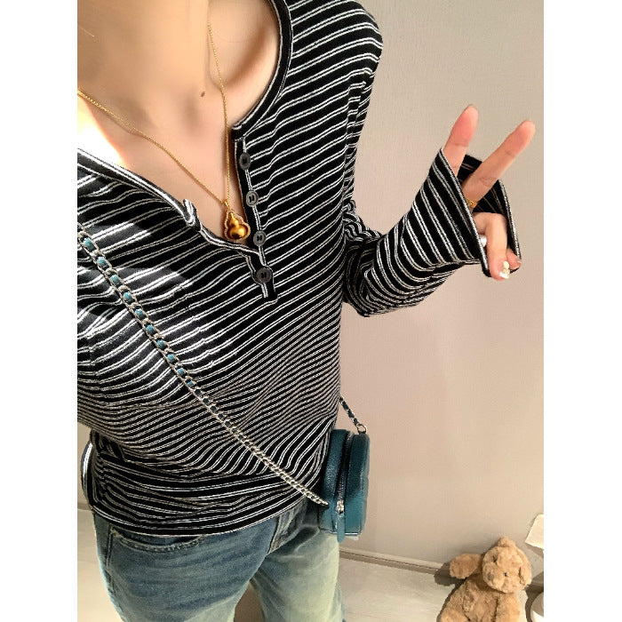 Women's long sleeve shirt with elaborate button design and striped pattern Chic & Stil