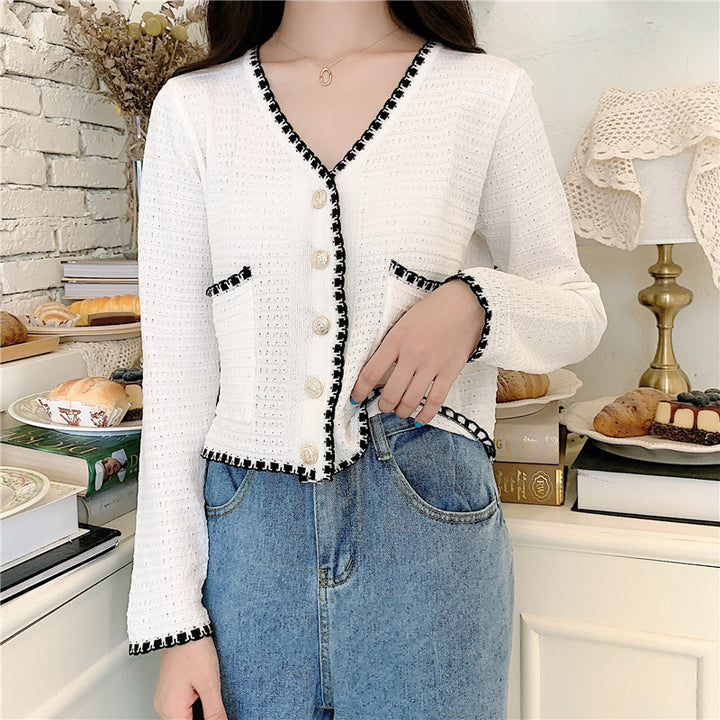 Ladies fashionable cardigan with contrasting details and button placket Chic & Stil