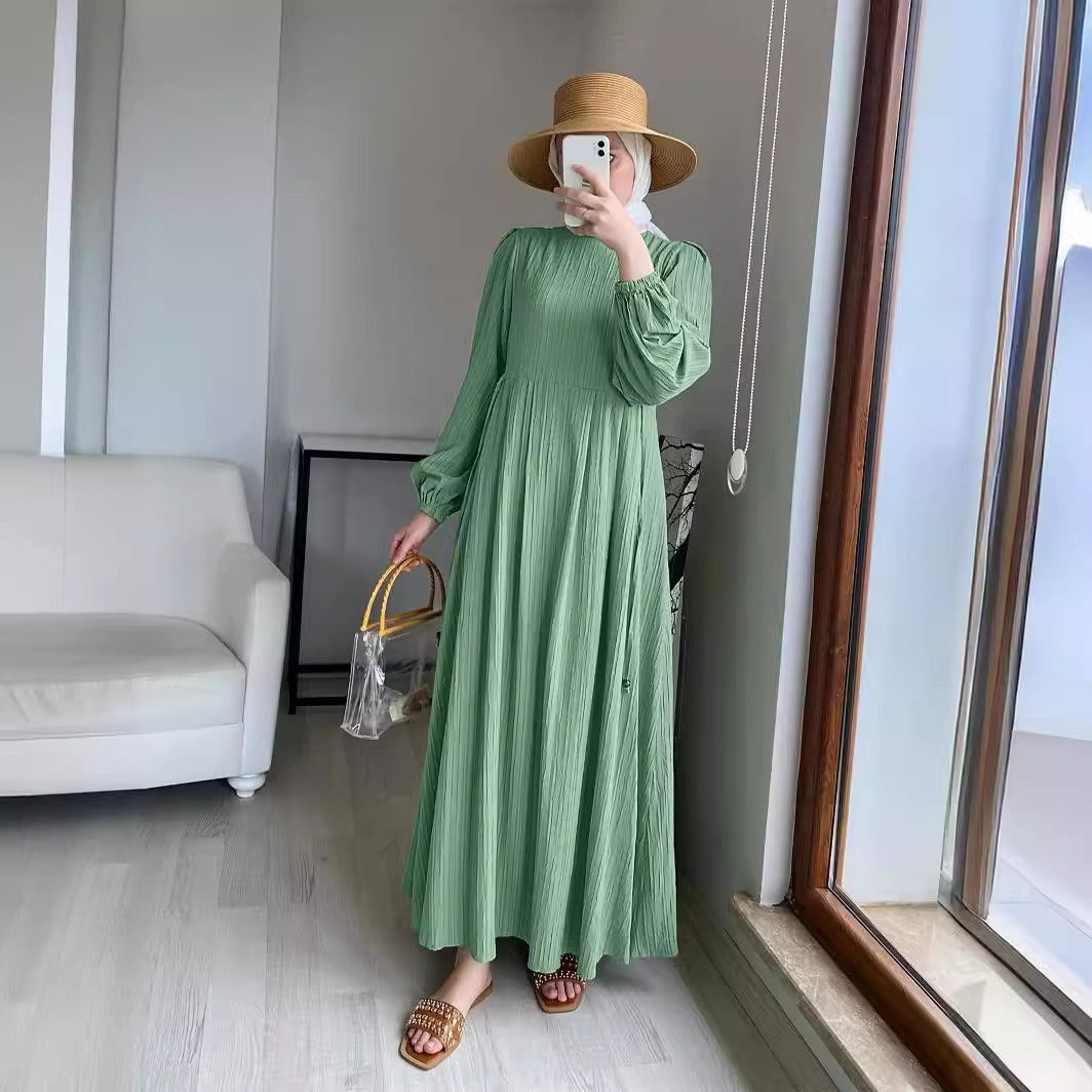 Maxi dress for women with an elegant pleated design and long puff sleeves Lune London
