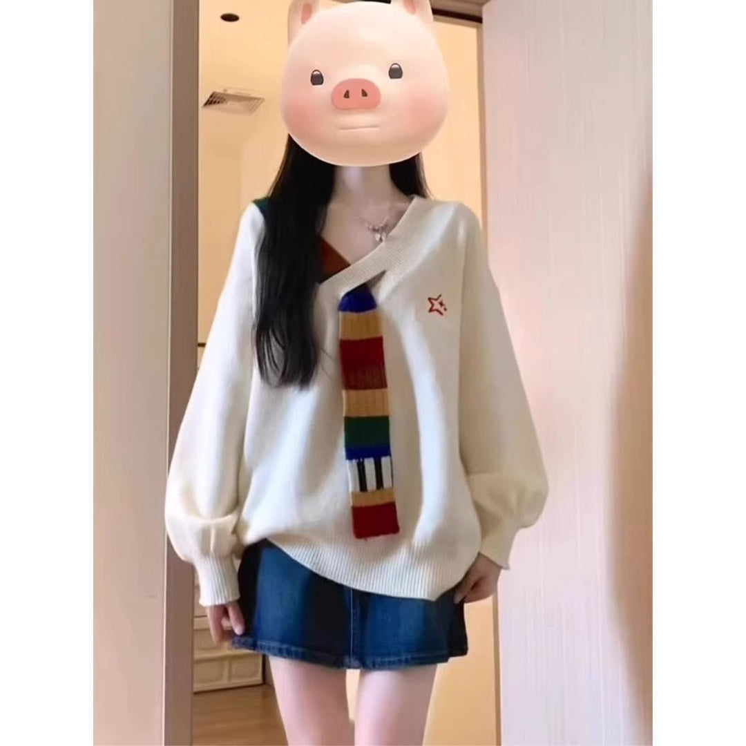 Pull élégant pour femme avec col en V et rayures colorées Chic & Stil