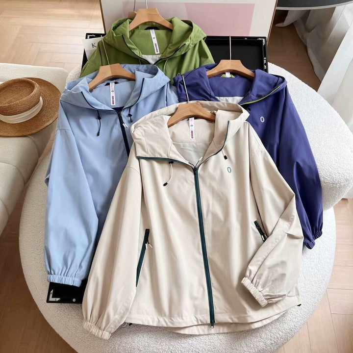 Veste coupe-vent légère pour femmes avec poches zippées sur les côtés Chic & Stil