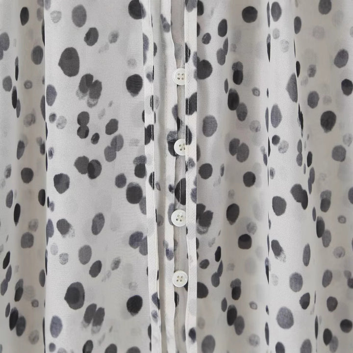 Blouse élégante pour femmes avec col demi et manches aérées Chic & Stil