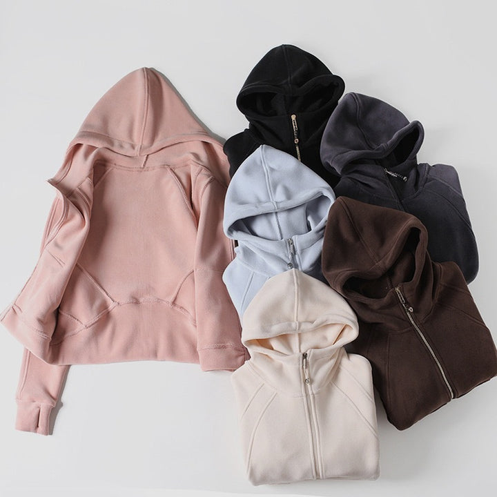 Veste à capuche confortable pour femme avec col montant et poches pratiques Chic & Stil