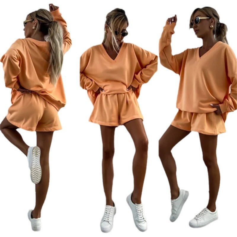 Casual outfit for women with oversized V-neck sweater and shorts Lune London